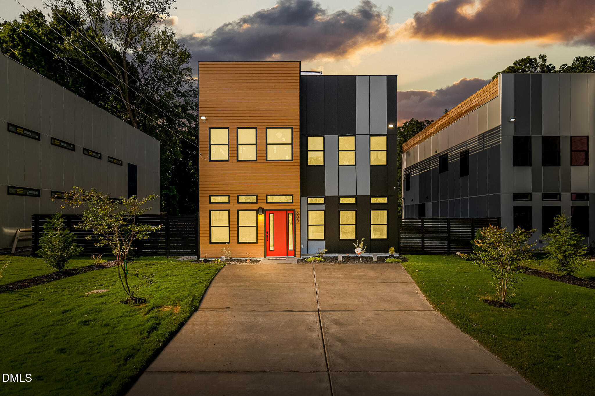 a view of a building with a yard
