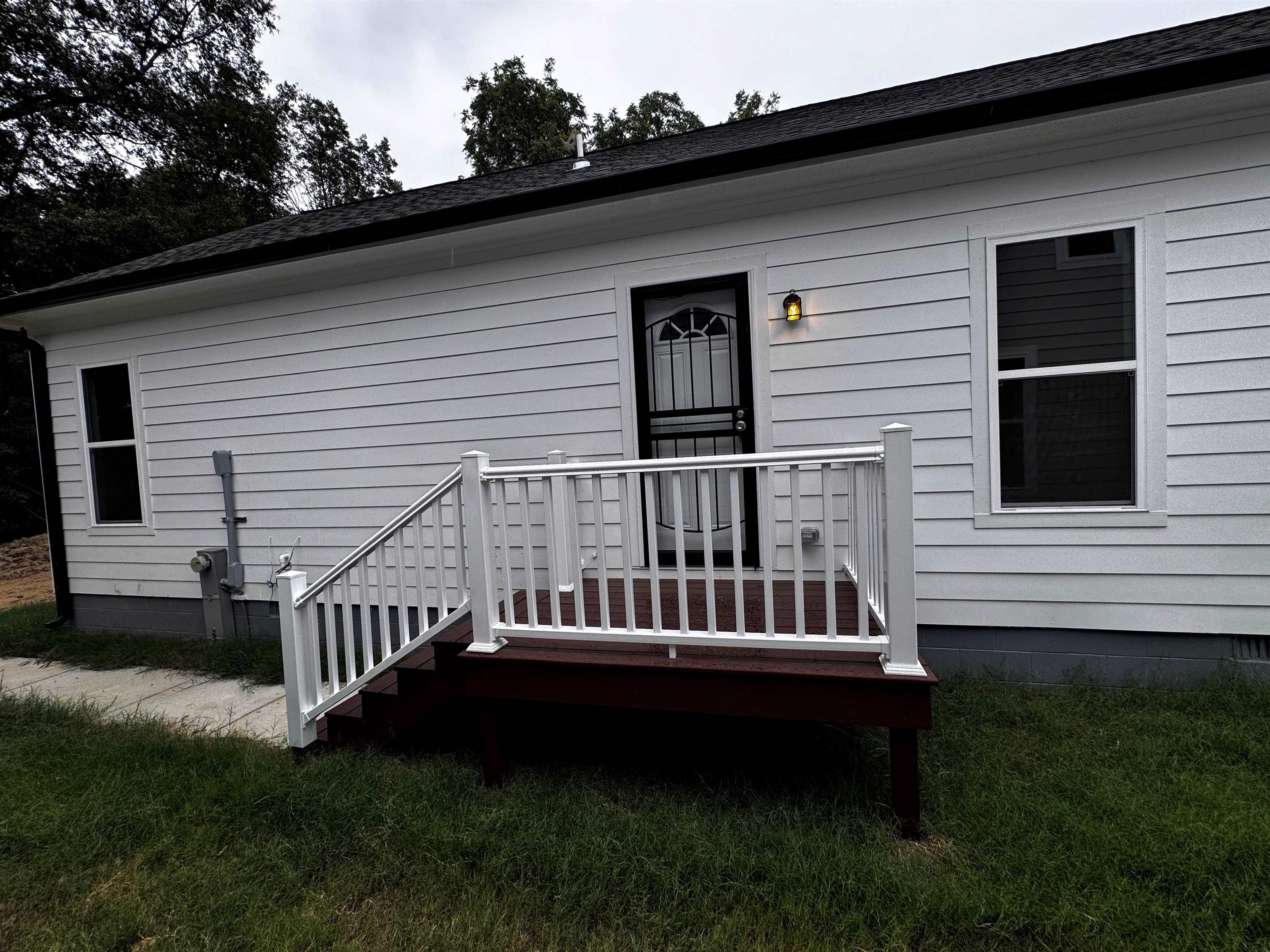 828 Semmes Street Memphis, TN 38111 - Photo 16 of 18 a view of a house with a deck