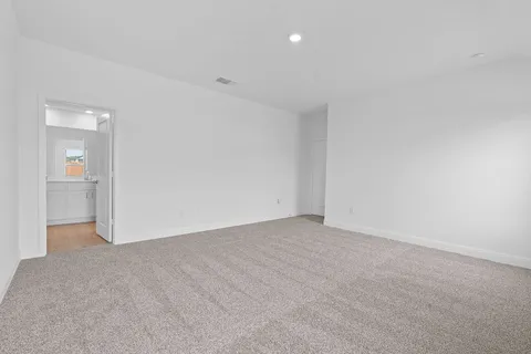 a kitchen with sink and cabinets