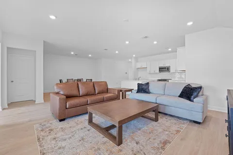 a living room with furniture and a couch