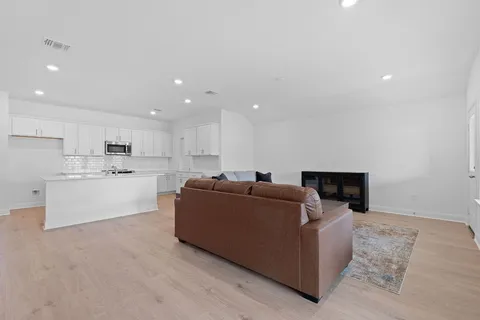 a living room with furniture and a couch