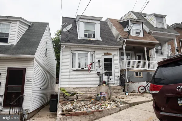 a front view of a house with a garage