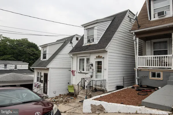 a backyard of a house with seating space