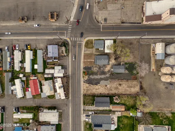 an aerial view of residential building with ocean view