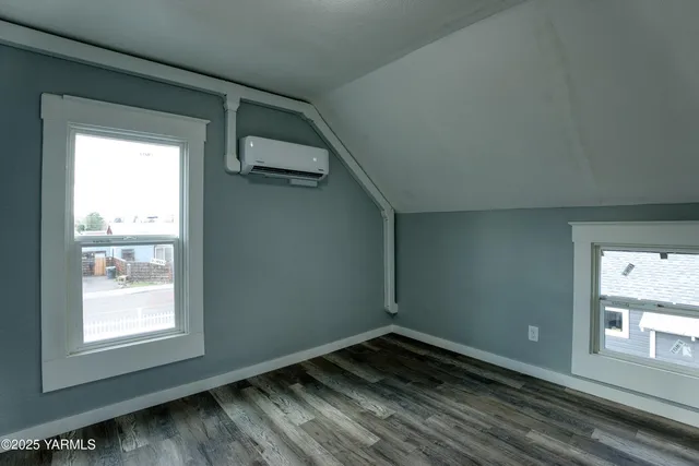 a view of a room that has a window