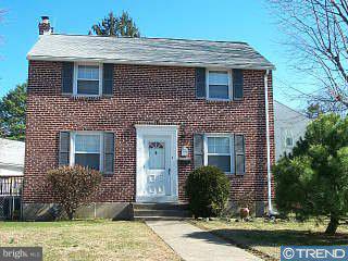 1030 Edgerton Road Secane, PA 19018 - Photo 2 of 5 a front view of a house with garden