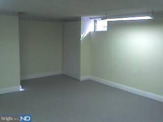 1030 Edgerton Road Secane, PA 19018 - Photo 5 of 5 a view of an empty room and window