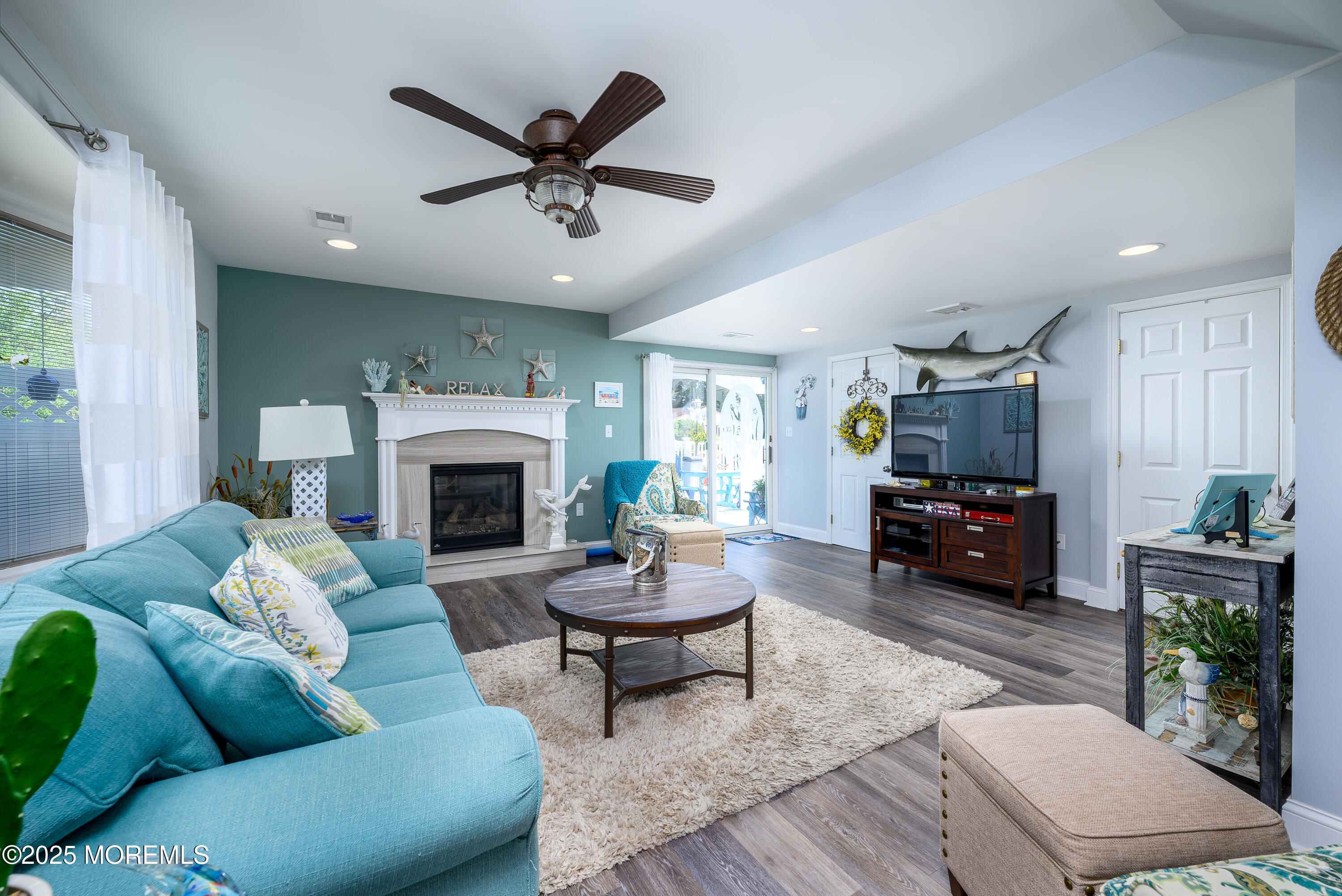 109 West Island Road Bayville, NJ 08721 - Photo 18 of 38 a living room with furniture fireplace and window