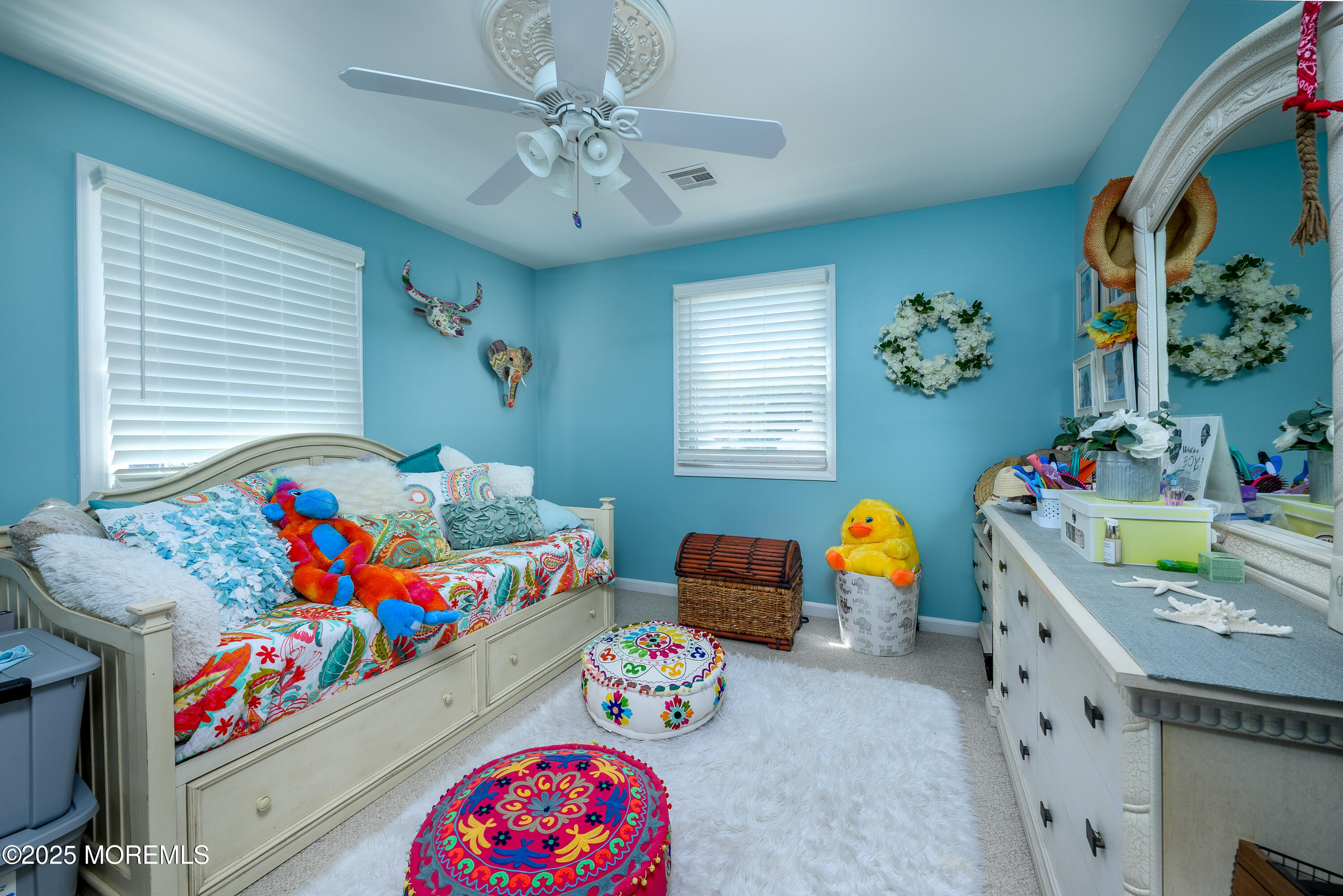 109 West Island Road Bayville, NJ 08721 - Photo 19 of 38 a bedroom with furniture and a window