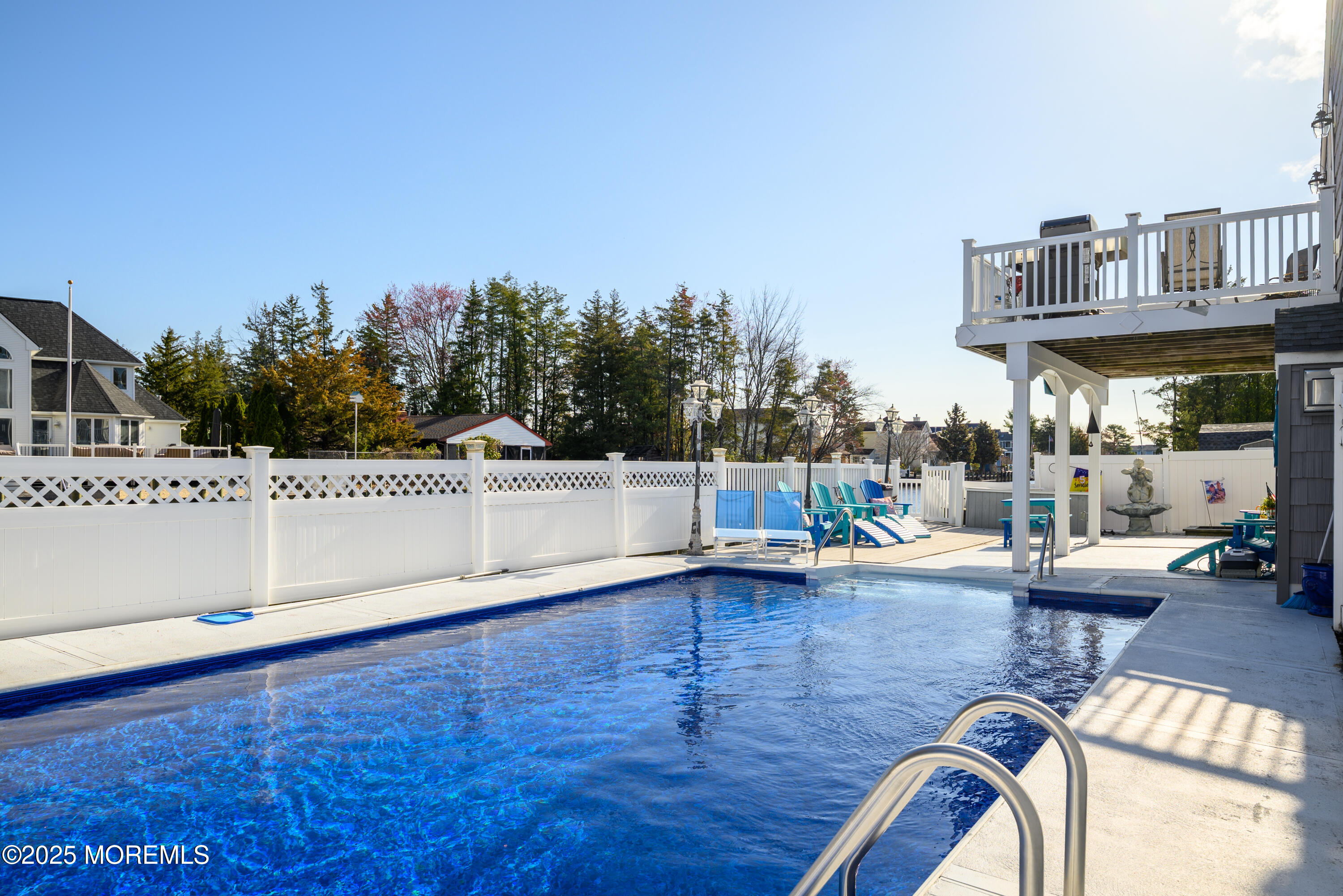 109 West Island Road Bayville, NJ 08721 - Photo 30 of 38 a view of a swimming pool with an outdoor seating