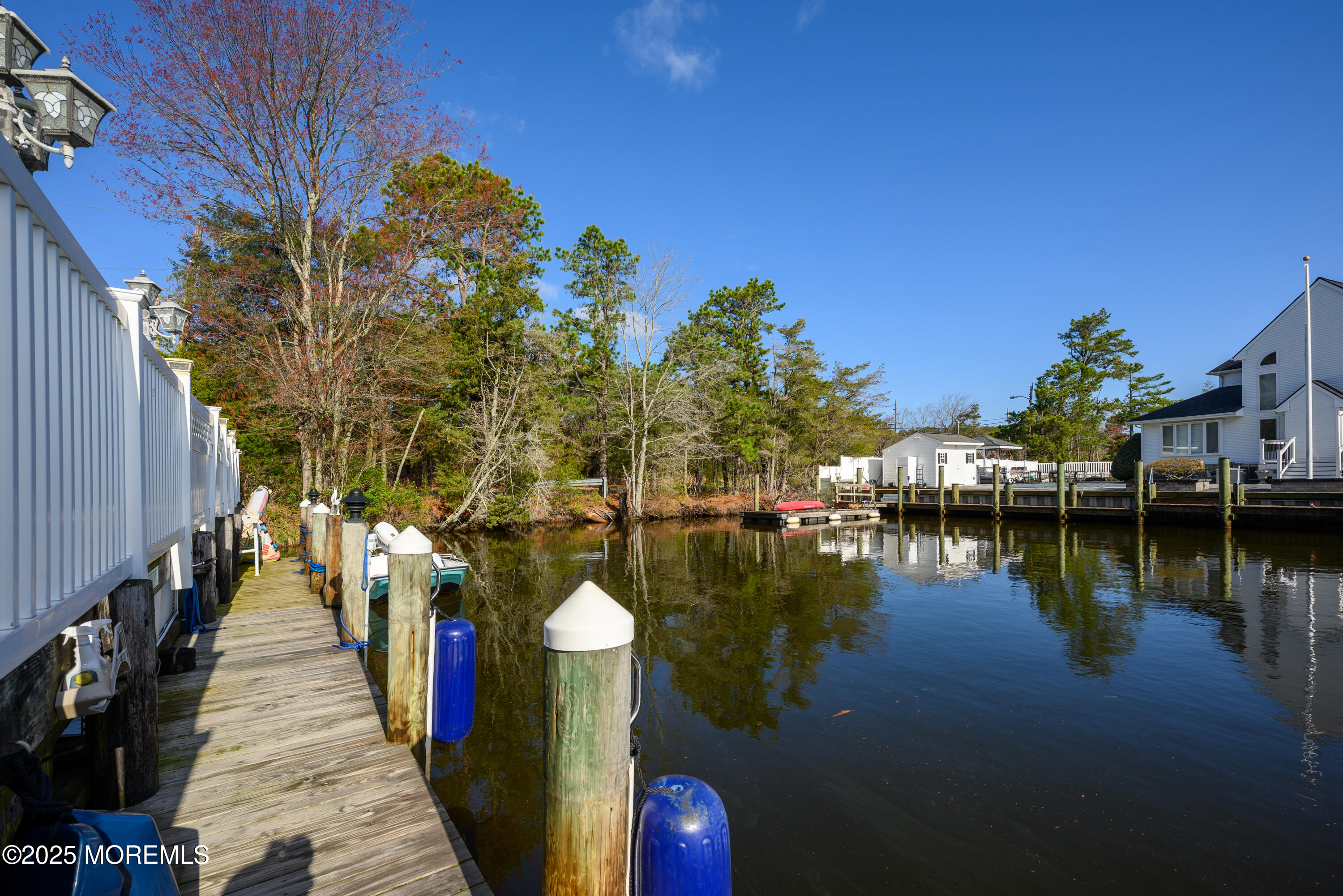 109 West Island Road Bayville, NJ 08721 - Photo 4 of 38 a view of a house with a lake