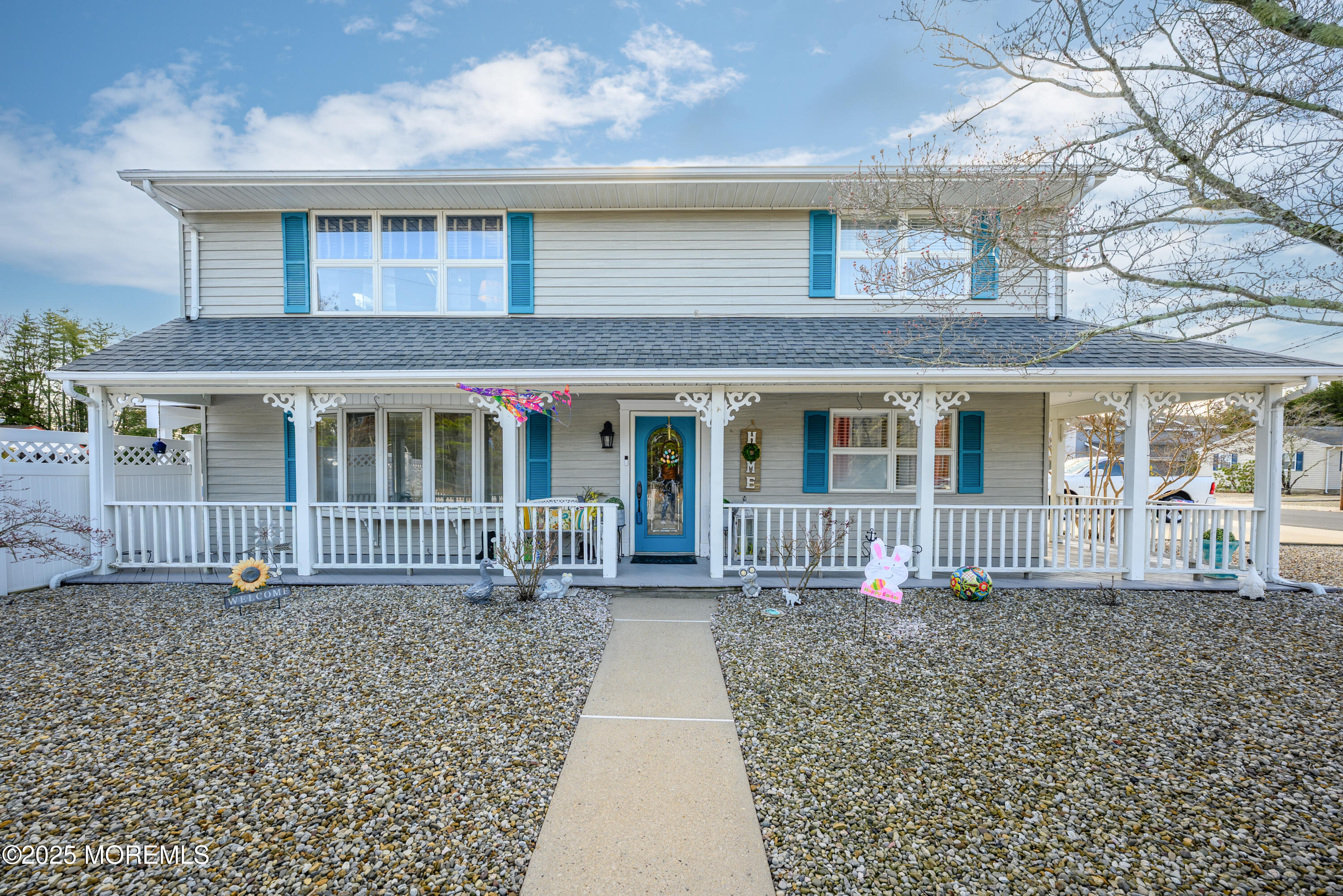 109 West Island Road Bayville, NJ 08721 - Photo 6 of 38 front view of a house with a porch