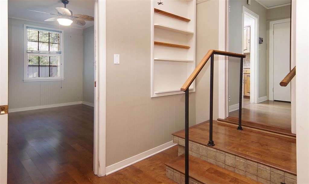 730 Indiana Street Graham, TX 76450 - Photo 9 of 25 a view of entryway and hall with wooden floor