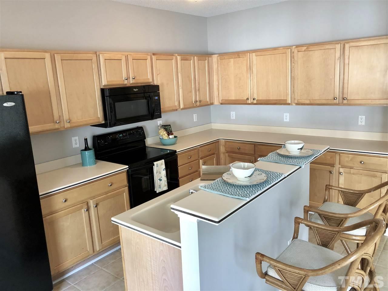 12542 Spruce Tree Way Raleigh, NC 27614 - Photo 5 of 25 Full kitchen with lots of storage, including roll out shelves in the lower cabinets!