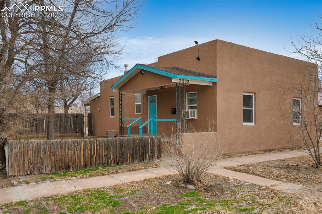 2232 East Routt Avenue Pueblo, CO 81004 - Photo 3 of 21 a front view of house with a yard