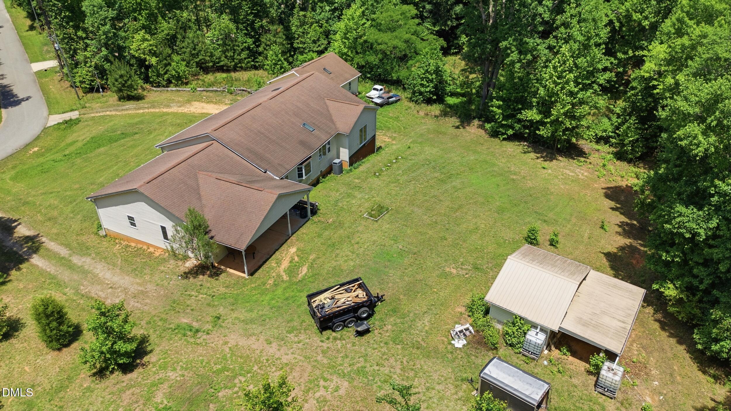 129 Shaman Drive Spring Hope, NC 27882 - Photo 32 of 43 an aerial view of a house with a yard