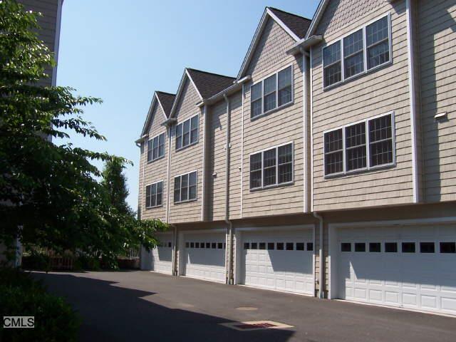 7 School Street, Unit 6 Norwalk, CT 06851 - Photo 1 of 1 a view of a house with a street
