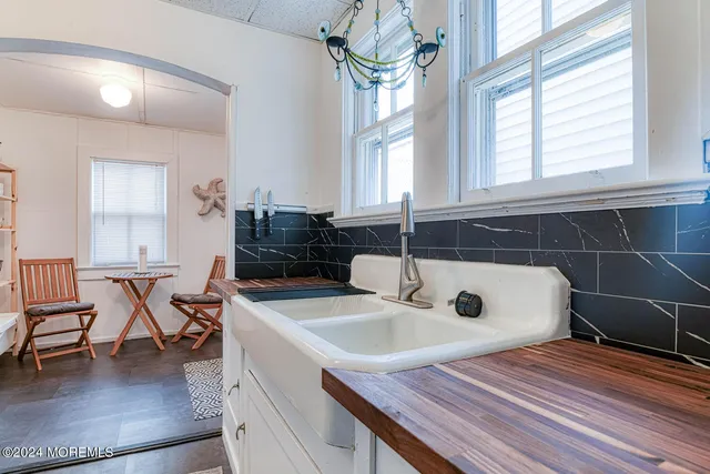 a bathroom with a sink and a bathtub