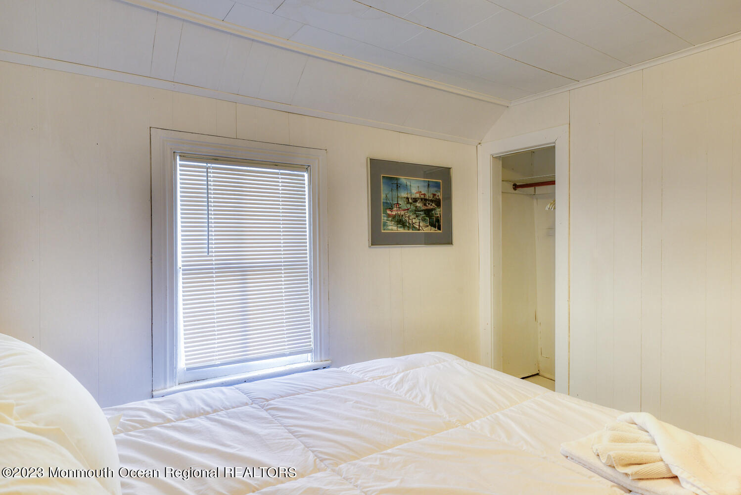 13 Pilgrim Pathway Ocean Grove, NJ 07756 - Photo 12 of 19 a view of a bedroom with wooden floor and window