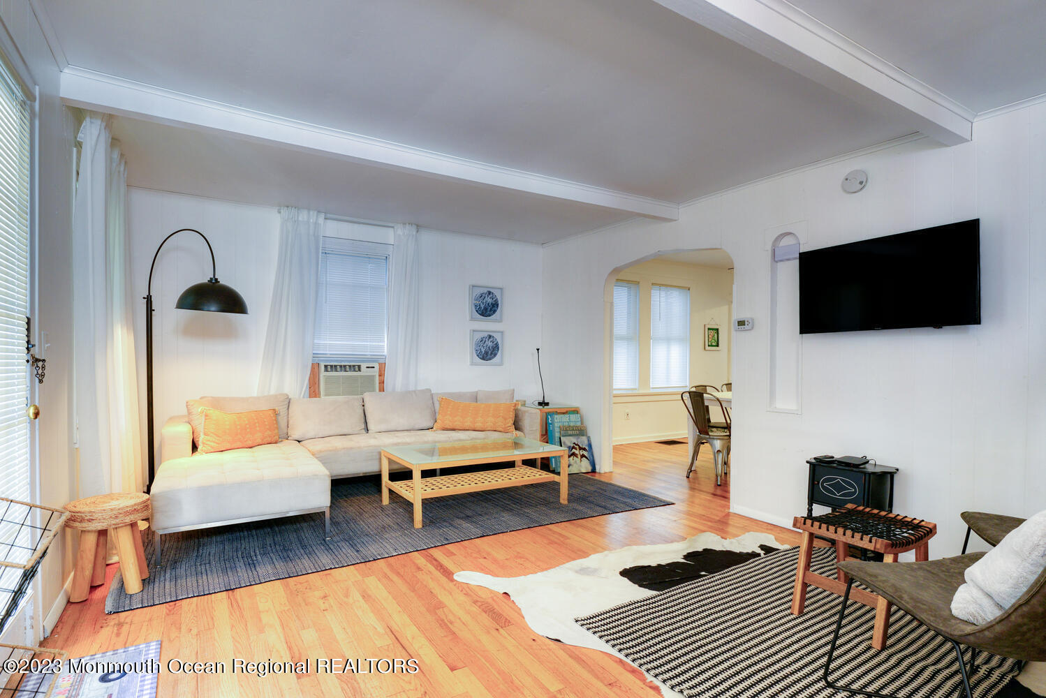 13 Pilgrim Pathway Ocean Grove, NJ 07756 - Photo 18 of 19 a living room with furniture and a flat screen tv