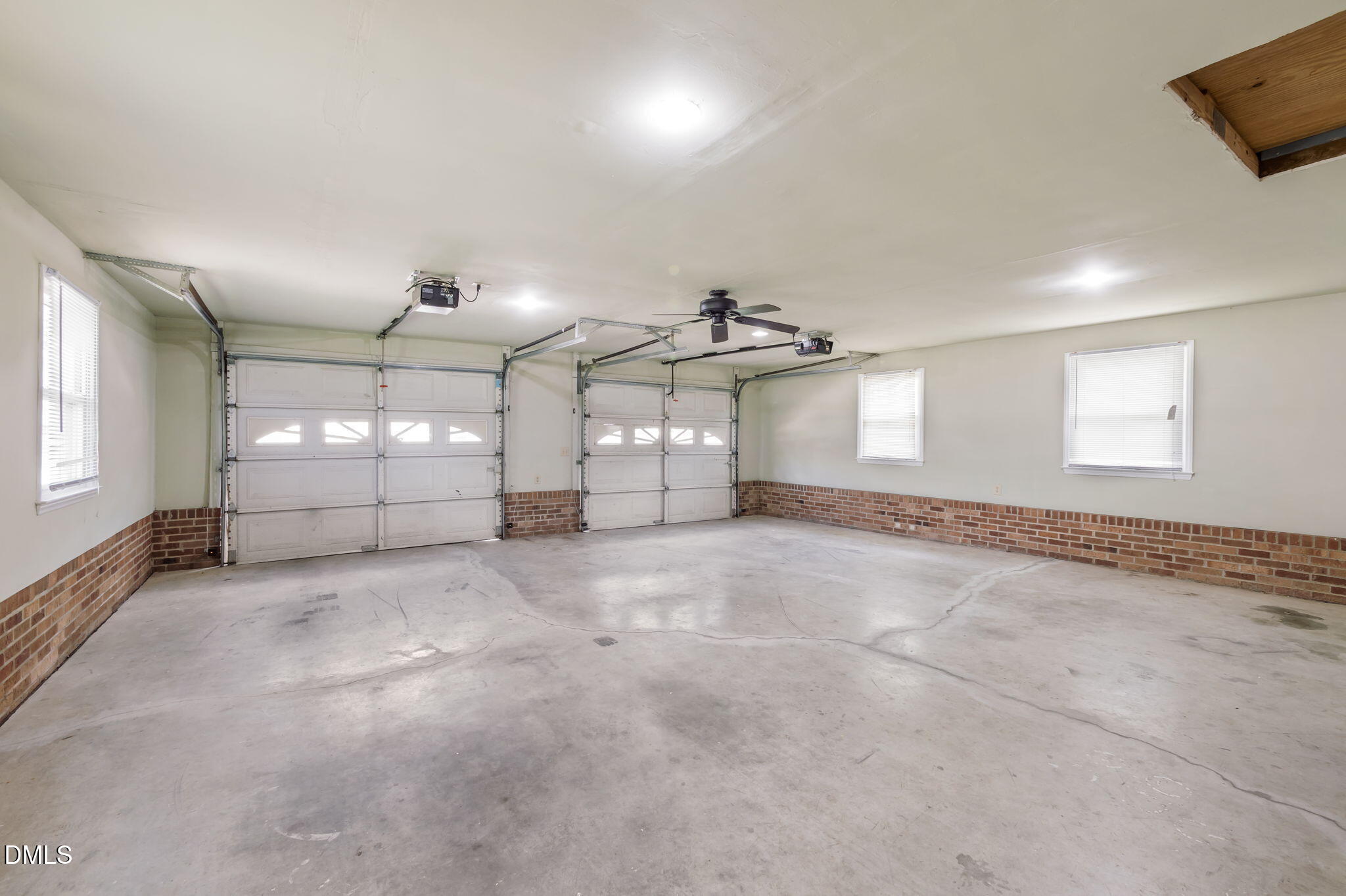 95 Harold Gill Road Roxboro, NC 27574 - Photo 27 of 53 an empty room with a empty space and windows