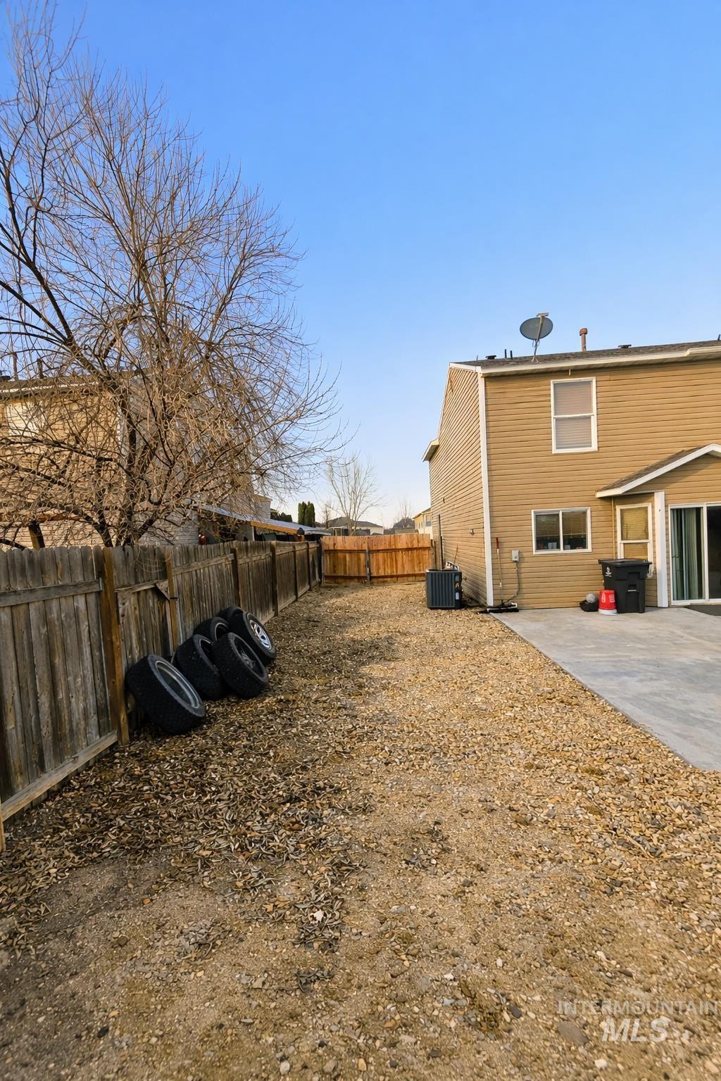 14057 Santa Cruz Street Caldwell, ID 83607 - Photo 25 of 26 Fenced backyard with a patio area
