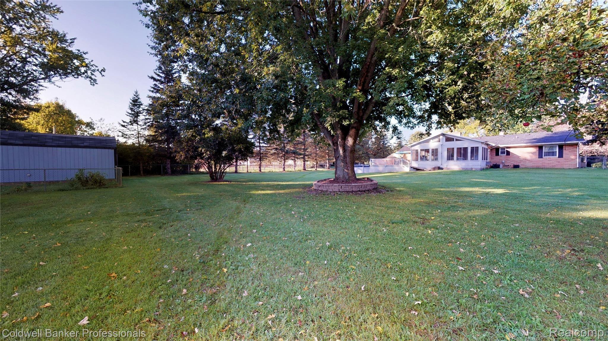 260 North Tipsico Lake Road Highland, MI 48357 - Photo 28 of 33 Back yard 1.jpg