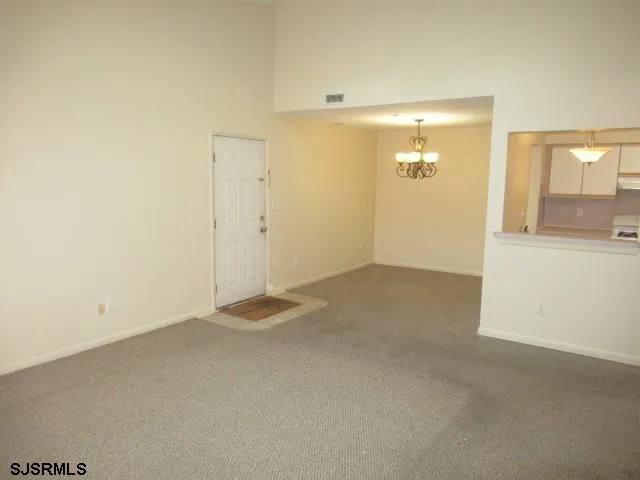 an empty room with a bathroom