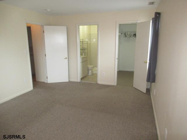 4 Oyster Bay, Unit 4K Absecon, NJ 08201 - Photo 7 of 8 a view of an empty room