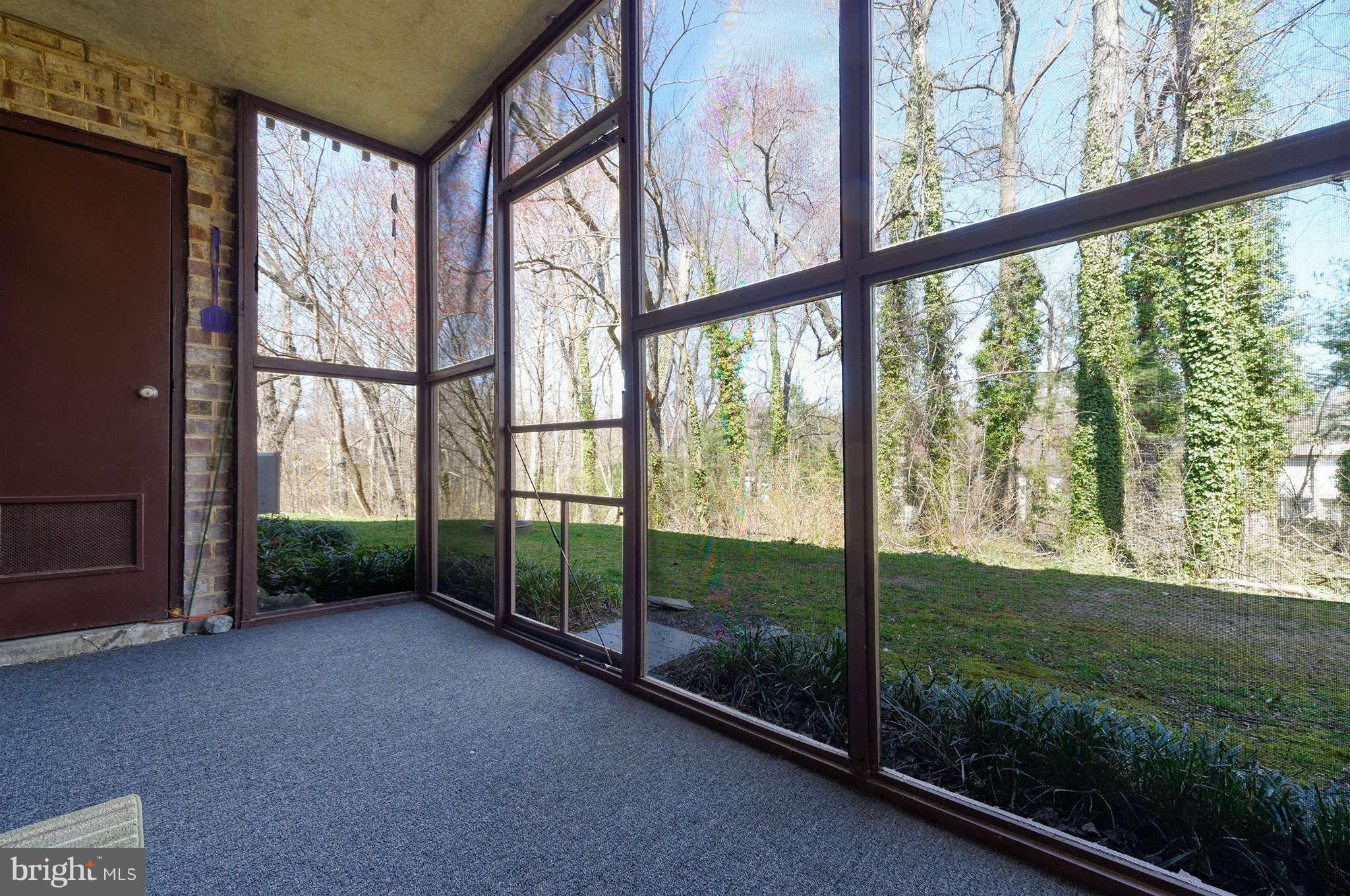 11601 Vantage Hill Road, Unit 1A Reston, VA 20190 - Photo 12 of 13 a view of a garden from a window