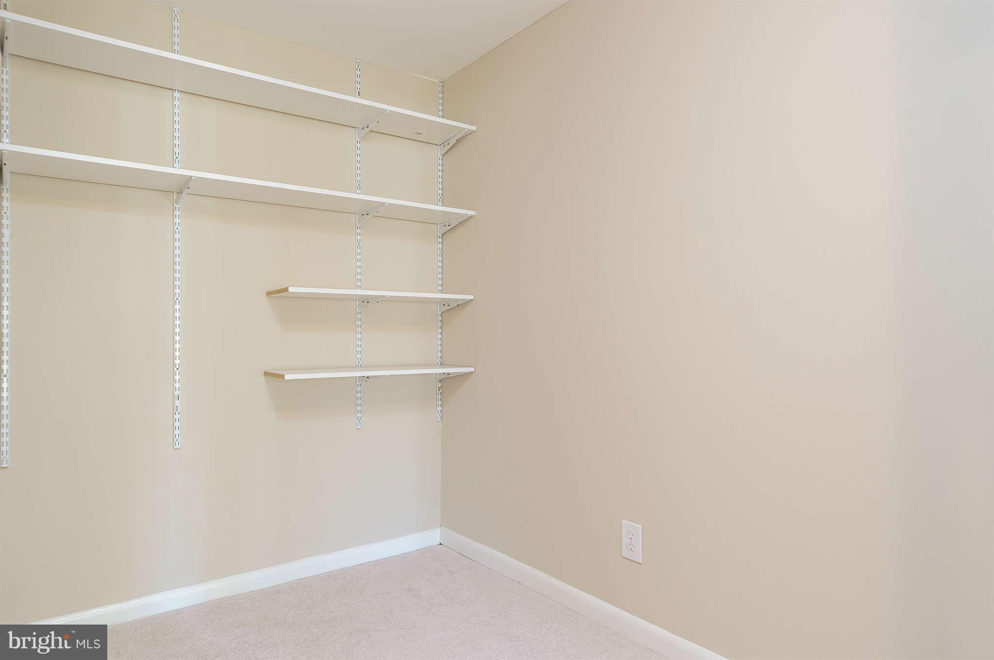 11601 Vantage Hill Road, Unit 1A Reston, VA 20190 - Photo 10 of 13 a view of an empty walk in closet
