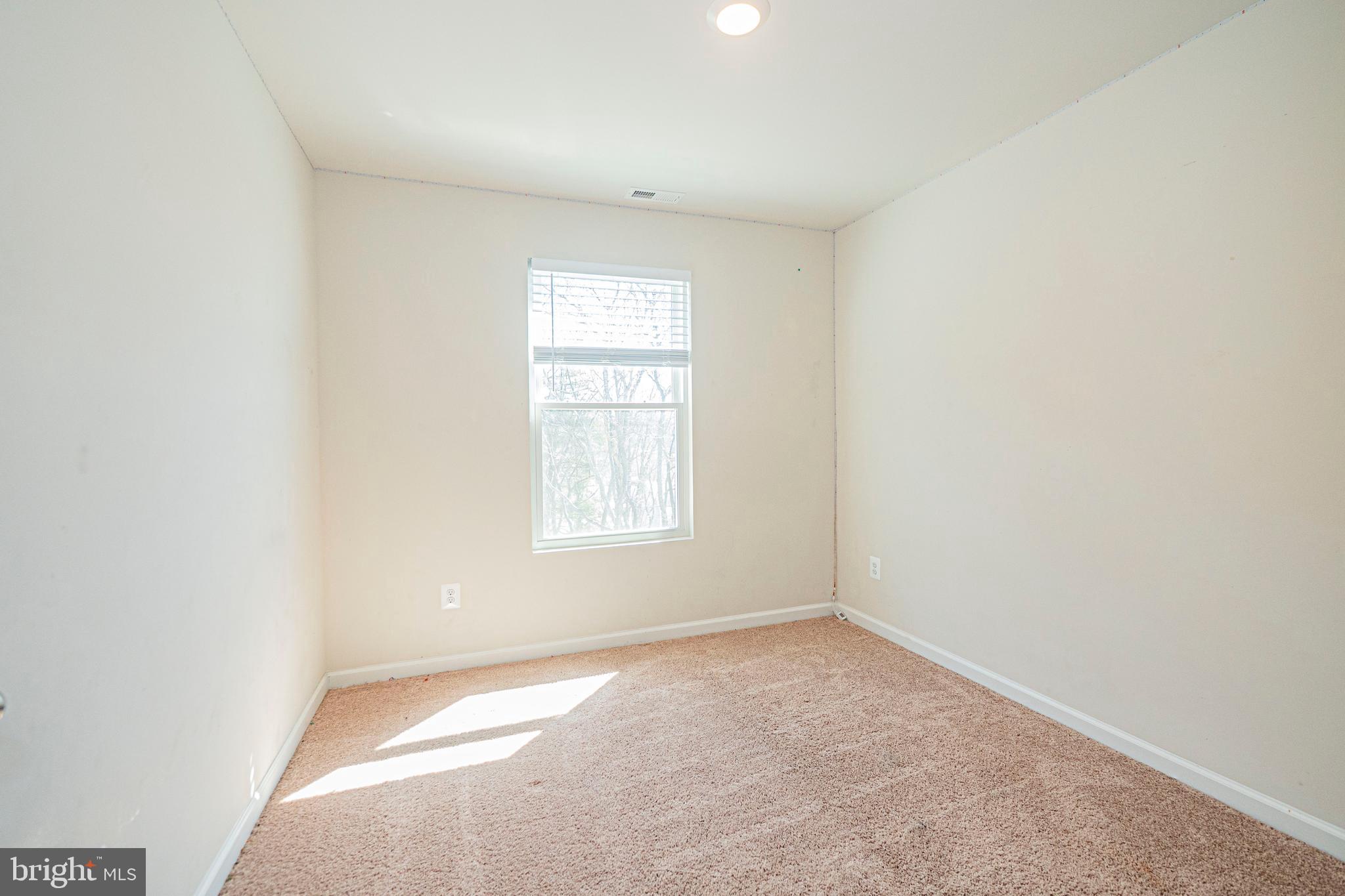 120 Paddington Street Falling Waters, WV 25419 - Photo 23 of 34 an empty room with a window