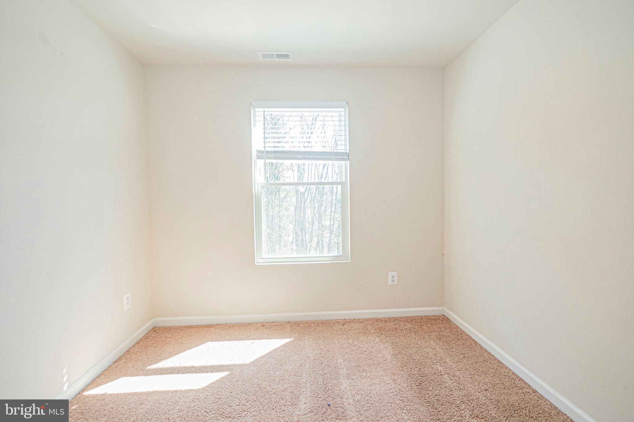 120 Paddington Street Falling Waters, WV 25419 - Photo 25 of 34 an empty room with a window