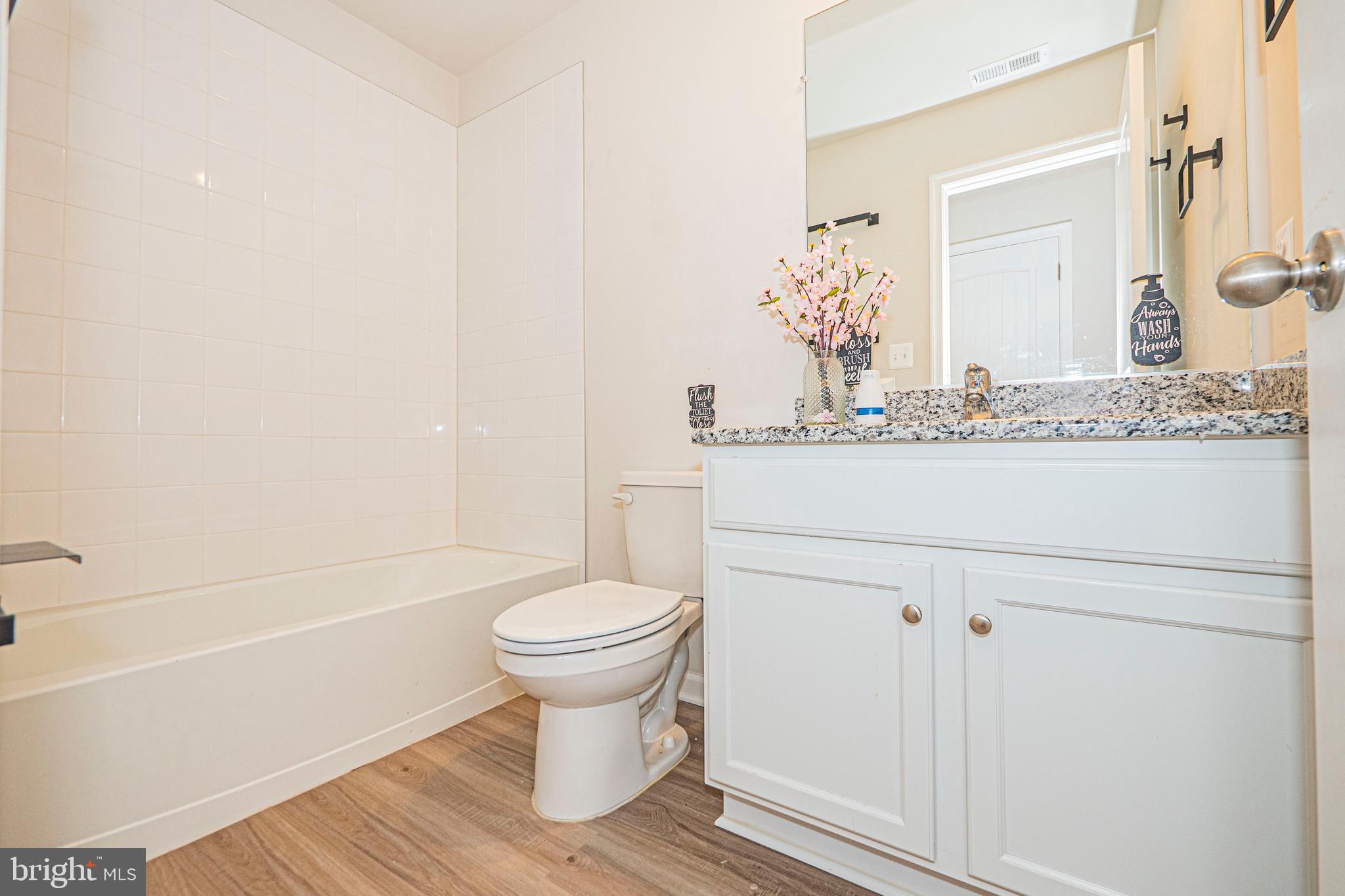 120 Paddington Street Falling Waters, WV 25419 - Photo 28 of 34 a bathroom with a sink a toilet and shower