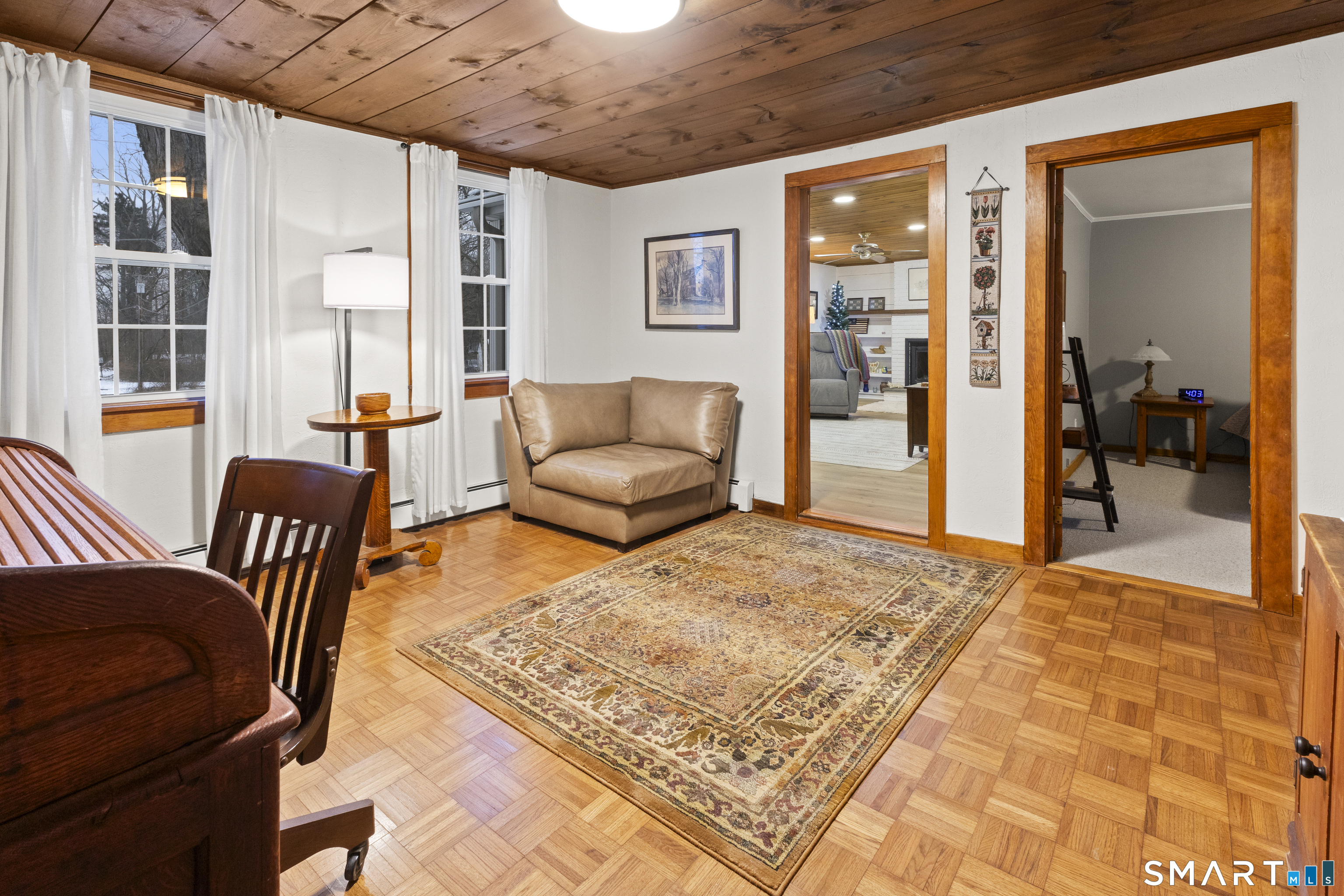 204 Paine Road Pomfret, CT 06259 - Photo 12 of 32 a living room with furniture and a rug