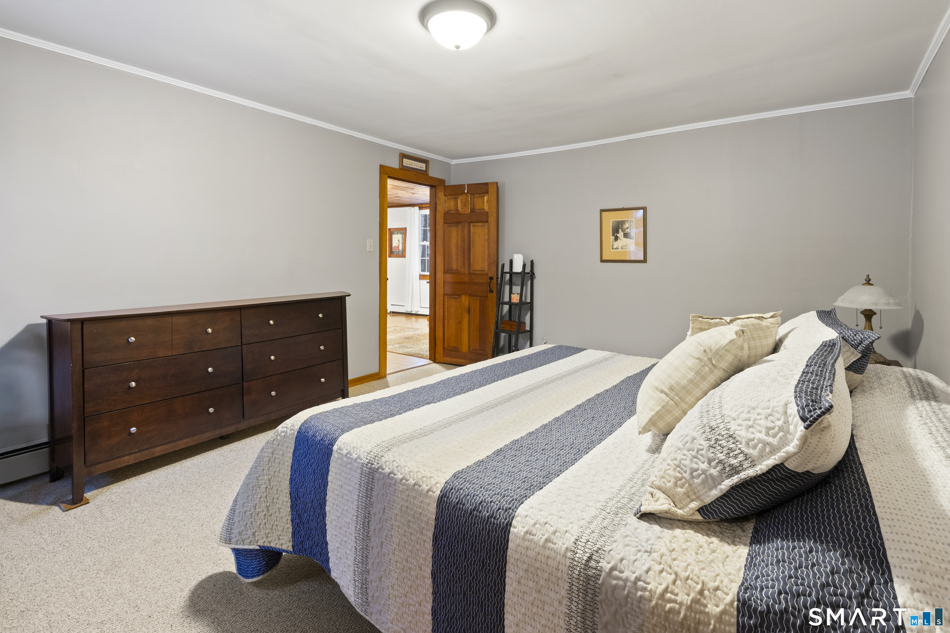 204 Paine Road Pomfret, CT 06259 - Photo 14 of 32 a bedroom with a bed and a closet