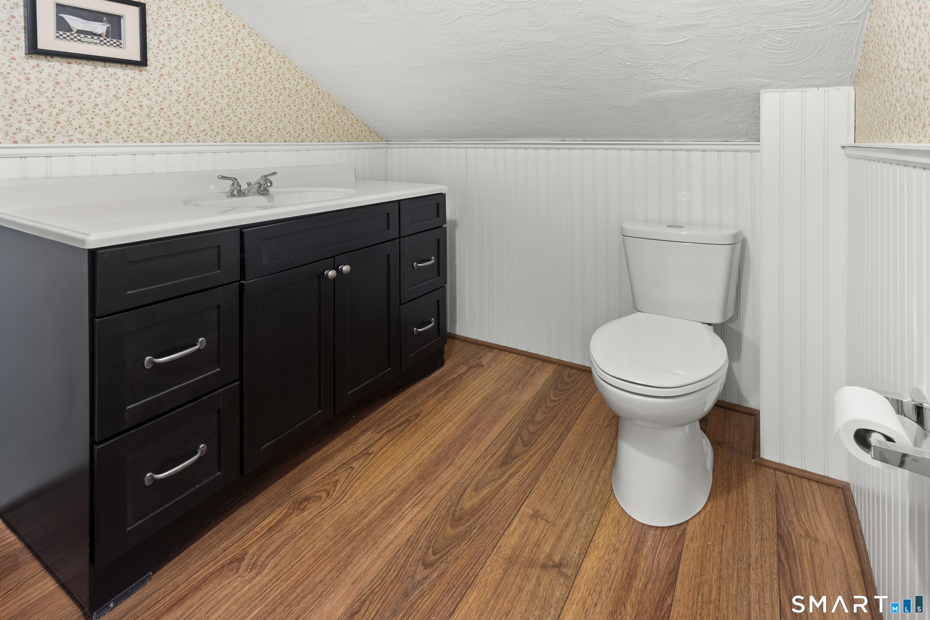 204 Paine Road Pomfret, CT 06259 - Photo 21 of 32 a bathroom with a sink and a toilet