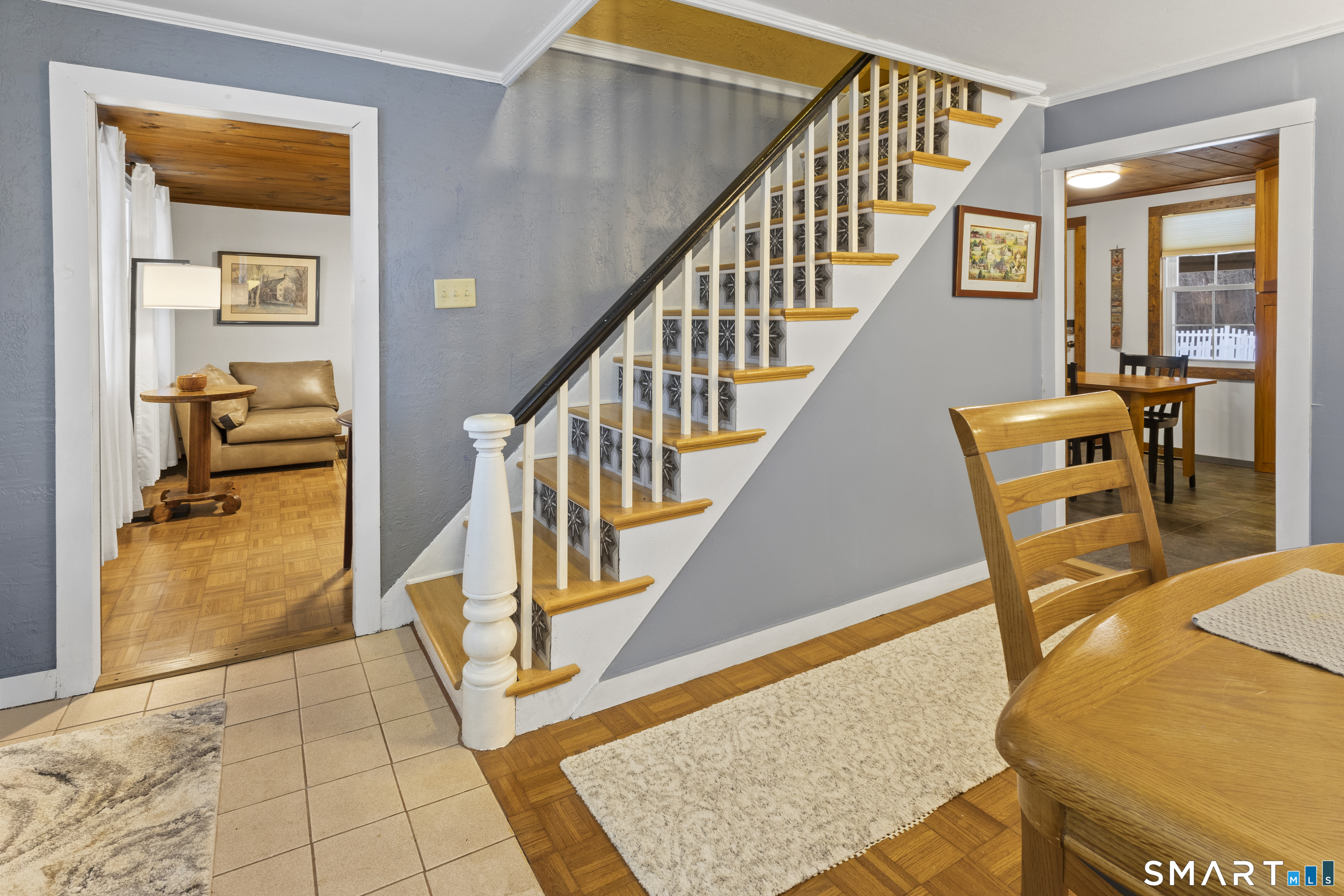 204 Paine Road Pomfret, CT 06259 - Photo 5 of 32 a view of a hallway with furniture and a rug
