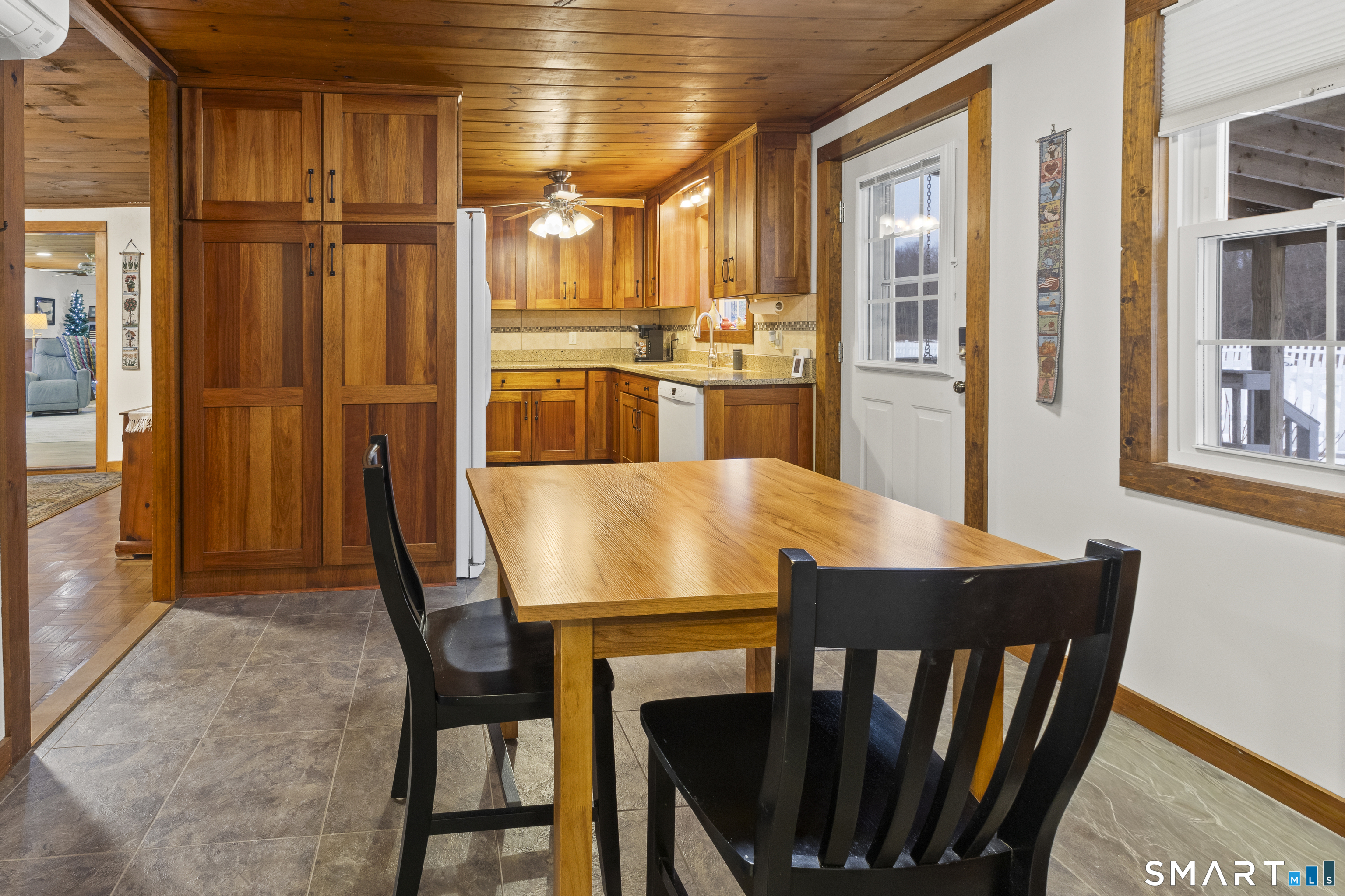 204 Paine Road Pomfret, CT 06259 - Photo 6 of 32 a view of a dining room with furniture