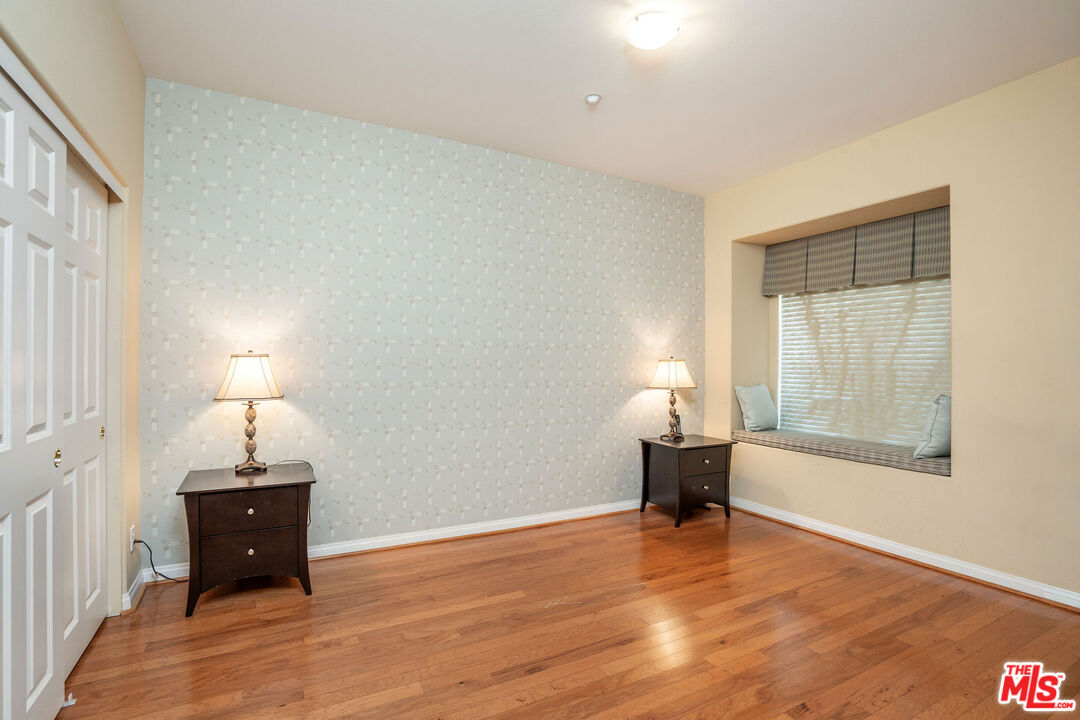1128 West Duarte Road, Unit A Arcadia, CA 91007 - Photo 5 of 28 a view of a room with wooden floor cabinet and windows