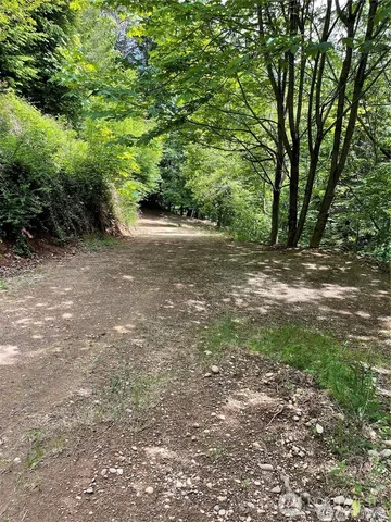 a view of outdoor space with a lake view