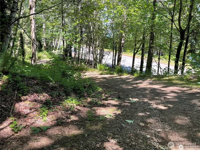 a view of a town with mountains in the background