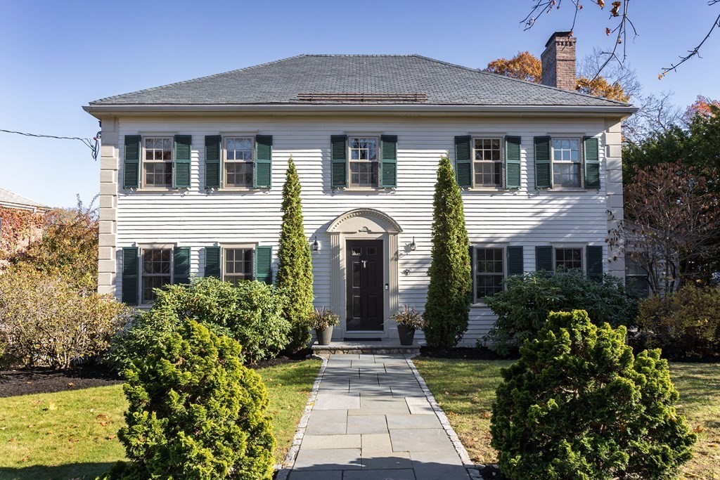 47 Arlington Road Brookline, MA 02467 - Photo 1 of 29 a front view of a house with garden