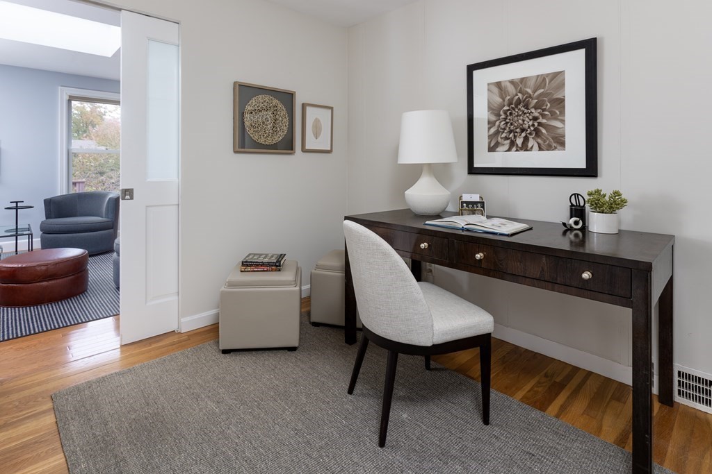 47 Arlington Road Brookline, MA 02467 - Photo 16 of 29 a workspace with furniture and window