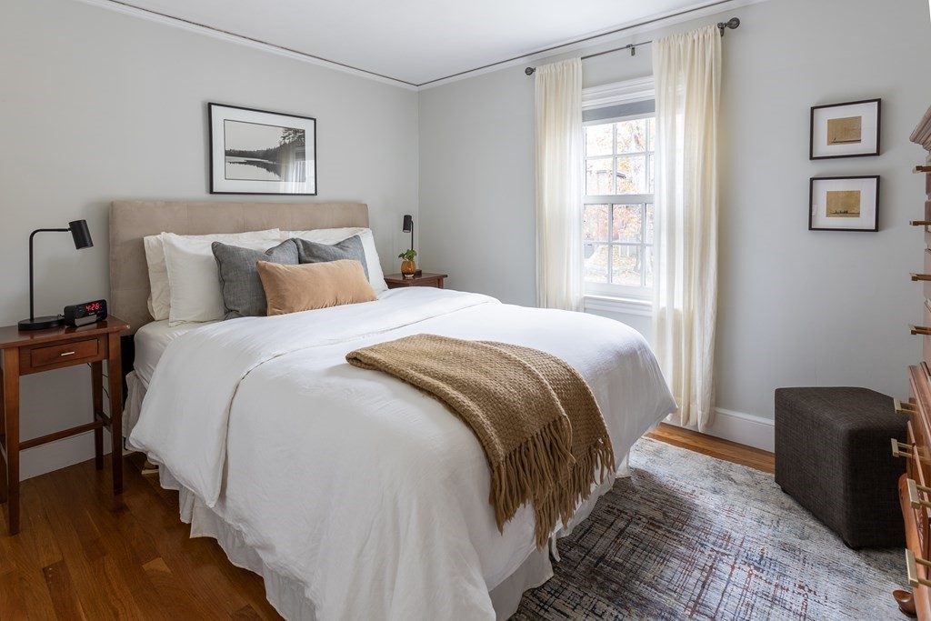 47 Arlington Road Brookline, MA 02467 - Photo 20 of 29 a bedroom with bed and a window