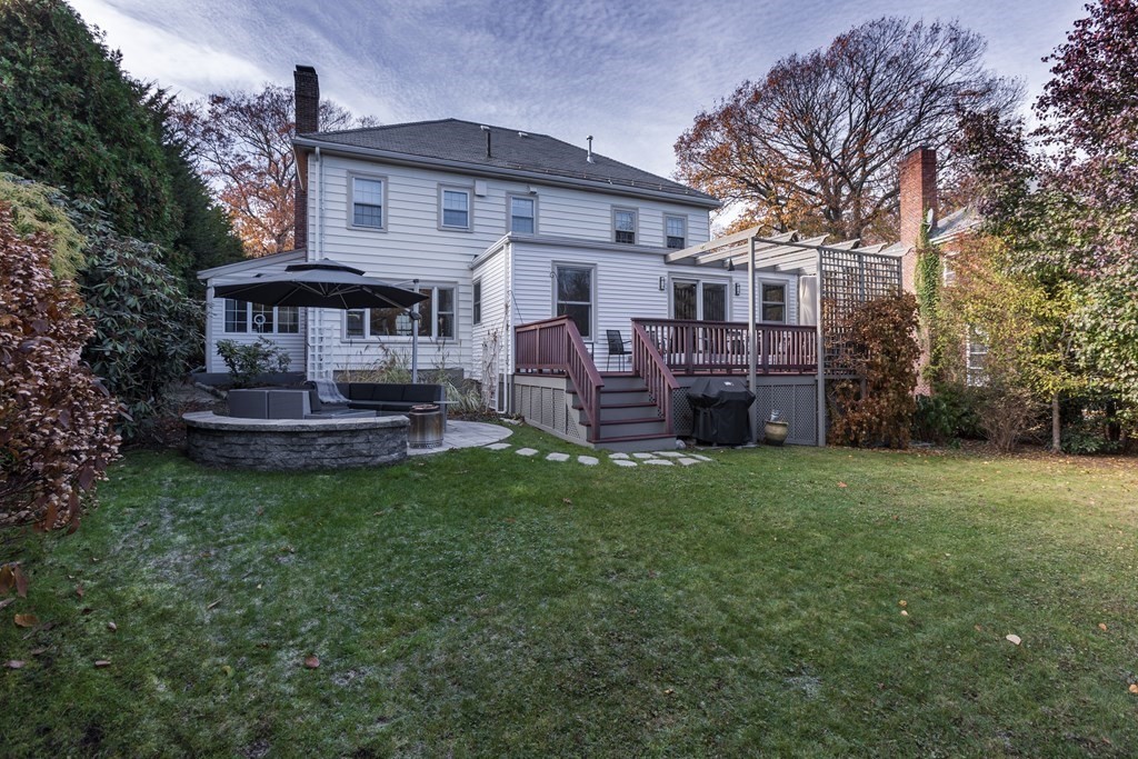 47 Arlington Road Brookline, MA 02467 - Photo 27 of 29 a view of a house with a back yard