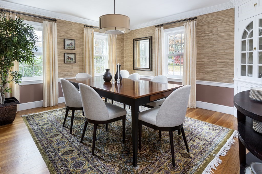 47 Arlington Road Brookline, MA 02467 - Photo 5 of 29 a view of a dining room with furniture window and wooden floor