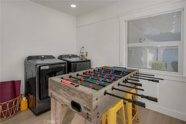 a bedroom with a bed and chair