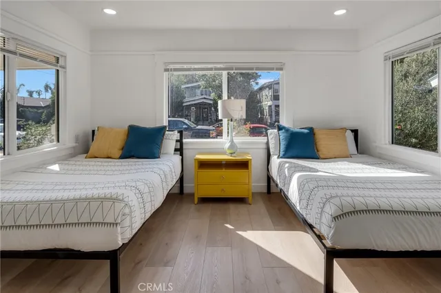 a bedroom with a bed and with lamp