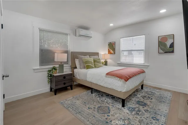 a view of a house with a yard and plants